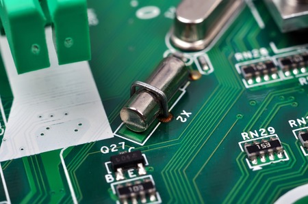 Capacitor and microchips, close up