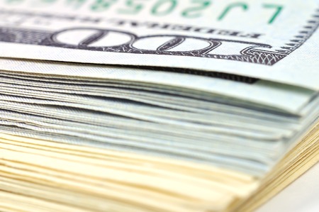Heap of one hundred dollar bills, close up
