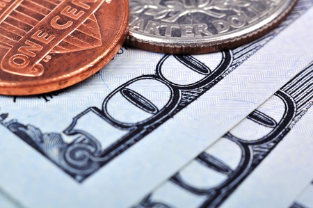 one hundred dollar bills and cent,  close up