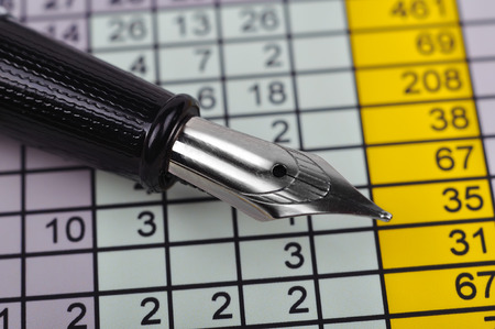 fountain pen and business report, close up