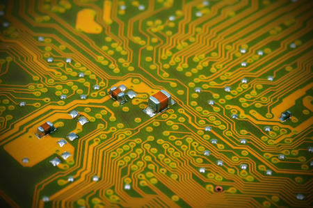 Electronic yellow circuit board, close upの写真素材