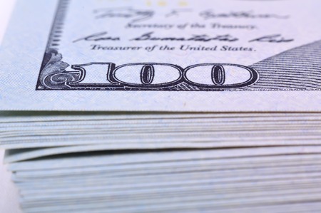 Heap of one hundred dollar bills, close upの写真素材