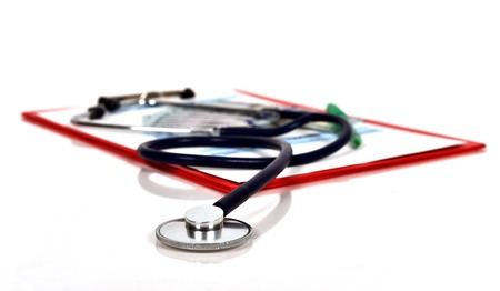 clipboard with medical form and stethoscope, close upの写真素材