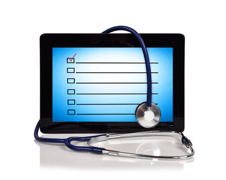 digital touch pad with checklist and stethoscopeの写真素材