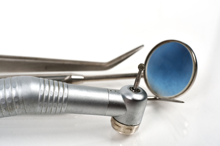 dentist's instruments on a whine backgroundの写真素材