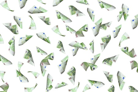 flying 100 euro bills on white backgroundの写真素材