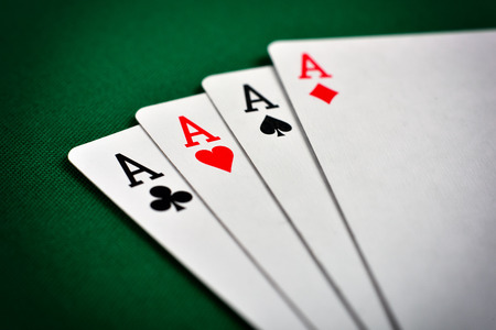 Four aces, including spades, hearts, clubs and diamonds