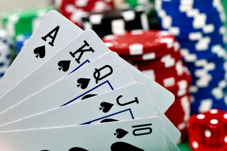royal flush and poker chips, extra close up