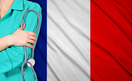 female doctor with stethoscope on italy flag backgroundの写真素材