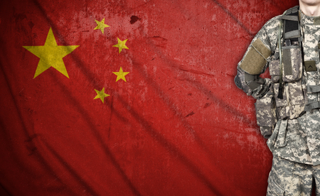 Turkish soldier on a Turkish flag on backgroundの写真素材