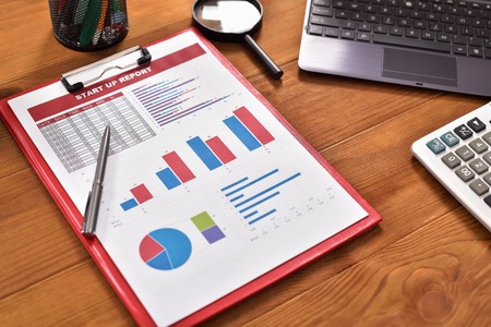 Start up report with graphs and tables on tableの写真素材