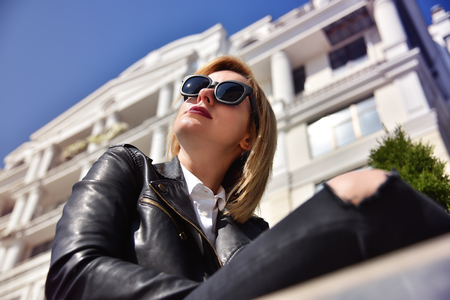 beautiful hipster girl in black leather jacket, close upの写真素材