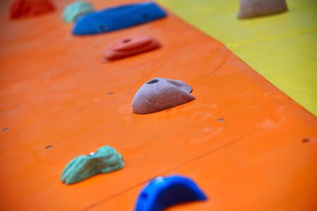 Artificial Practice Climbing Wall For Climbers. Close Upの写真素材