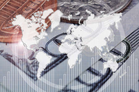 World map with stock chart on hundred dollar bills and cent background. Global finance and trade concept.の写真素材