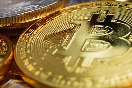 Close up of golden bitcoin currency. Virtual money and payment concept.の写真素材