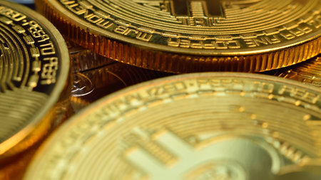 Golden coins with bitcoin symbol. Cryptocurrency and payment concept. Close upの写真素材