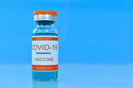 Ampoule ith Covid-19 vaccine. Medicine and corona virus infection concept. Close upの写真素材