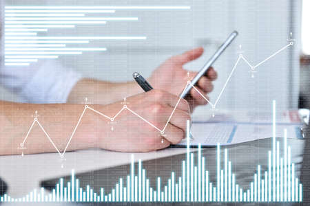 Trader man with smartphone analyzing at data and checking business plan. Investment and financial...
