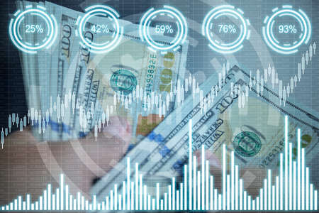 Businessman hands counting dollar, spreadsheet, stock data and percentage charts. Investment and...