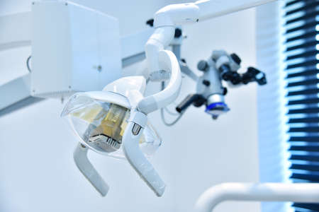 Dental office with dental lamp and equipment. Dentistry and health care concept. Close upの写真素材