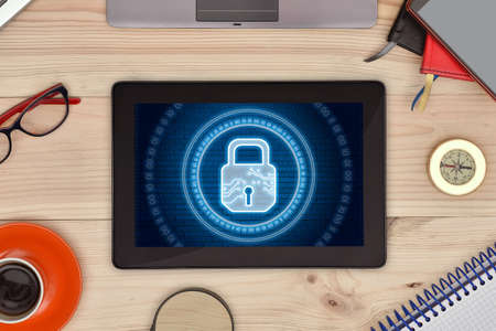 Tablet computer and digital lock icon hologram with circle binary numders on screen. Cyber security...