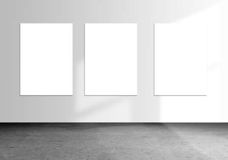 Three blank poster on white wall in room. Art and promotion information for marketing announcements concept. 3d renderingの写真素材