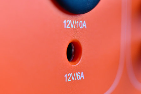 Input 12 volts on portable power station. Concept of backup energy and technology. Close up