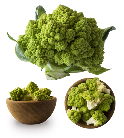 Roman cauliflower in wooden bowl isolated on white background. Roman cauliflower close up. Fractal texture of romanesco broccoli. Roman cauliflower with copy space for text.の写真素材