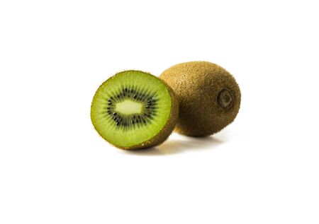 Kiwi fruit and slice isolated on white background. Tropical fruits on white. Kiwi with copy space for text.の写真素材