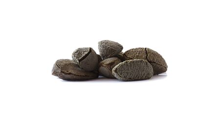 Studio shot of brazil nuts on white background. Brazil nuts in nutshell isolated on white.  Brazil...