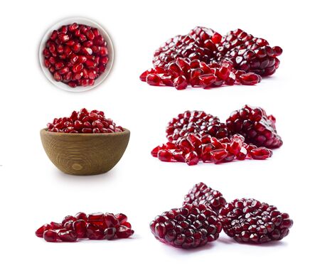 Pomegranate isolated on white background. Sweet and juicy garnet with copy space for text. Garnets isolated on white. Set of pomegranate seed from different angles on white.の写真素材