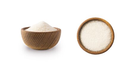 Heap of granulated sugar isolated on white background. Top view. Heap of sugar on white background. Wooden bowl of white sugar isolated on white background. Sugar in wooden bowl for cooking, isolated.の写真素材