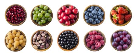 Top view. Fruits and berries in bowl on white background. Fruits with copy space for text. Collage of different fruits and berries isolated on a white background. Fruits and berries isolated on white.の写真素材