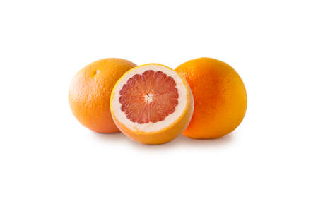 Ripe and tasty grapefruits isolated on white background. Fresh cut grapefruit with copy space for text. Citrus fruit isolated. Immunity system improvement. Antiviral treatment. Virus preventionの写真素材