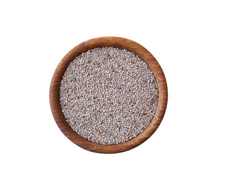 Chia seeds in a wooden bowl isolated on white with clipping path. Bowl of chia seeds isolated on white. White chia superfood. healthy eating concept.の写真素材