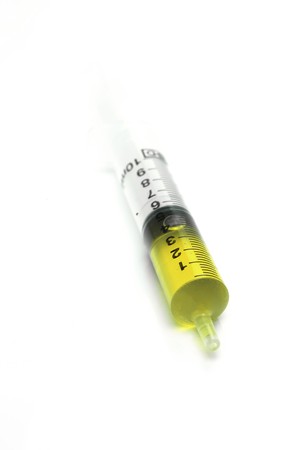 A syringe isolated against a white backgroundの写真素材