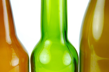 Empty beer bottles isolated against a white backgroundの写真素材