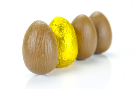 Chocolate easter eggs isolated against a white backgroundの写真素材