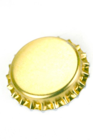 Bottle caps isolated against a white backgroundの写真素材