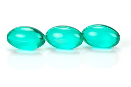 Headache Capsules isolated against a white backgroundの写真素材