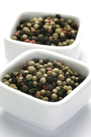 A close up shot of mixed pepper corns mixed together の写真素材