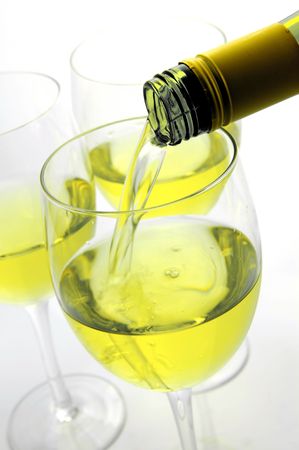 Glasses of white wine isolated against a white backgroundの写真素材