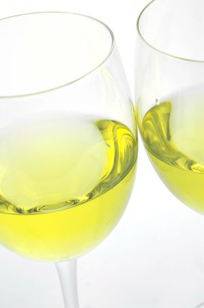 Glasses of white wine isolated against a white backgroundの写真素材