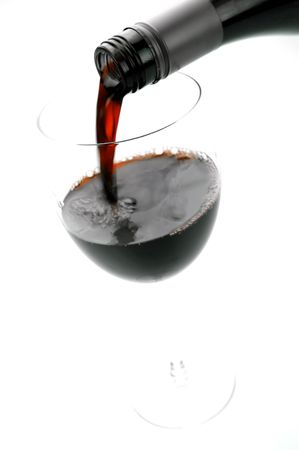 Glasses of red wine isolated against a white backgroundの写真素材