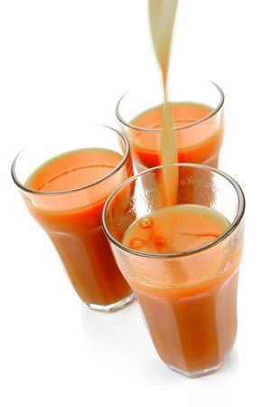 Tomato juice isolated against a white backgroundの写真素材