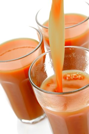Tomato juice isolated against a white backgroundの写真素材