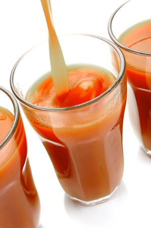 Tomato juice isolated against a white backgroundの写真素材