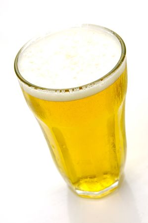 Glasses of beer isolated against a white backgroundの写真素材