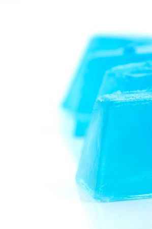 Blue ice blocks isolated against a white backgroundの写真素材