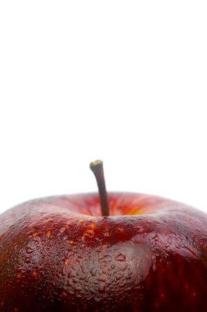 A red apple isolated against a white backgroundの写真素材